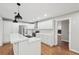 Modern kitchen with white cabinets and quartz countertops at 148 Walker Nw Rd, Cartersville, GA 30121