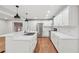 Modern kitchen with white cabinets and quartz countertops at 148 Walker Nw Rd, Cartersville, GA 30121
