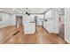 Open concept kitchen with white cabinets and island at 148 Walker Nw Rd, Cartersville, GA 30121