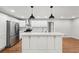 Modern kitchen with white cabinets, stainless steel appliances and island at 148 Walker Nw Rd, Cartersville, GA 30121