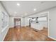 Open concept living room with hardwood floors and kitchen view at 148 Walker Nw Rd, Cartersville, GA 30121