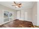 Sunroom features wood-look flooring and sliding glass doors at 148 Walker Nw Rd, Cartersville, GA 30121