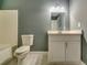 Clean bathroom with white vanity and gray walls at 6269 Colonial Vw, Fairburn, GA 30213