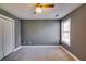 Bright bedroom with gray walls and carpet flooring at 6269 Colonial Vw, Fairburn, GA 30213