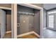 Laundry area with built-in shelving and exterior access at 6269 Colonial Vw, Fairburn, GA 30213