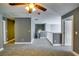 Spacious loft area with gray walls and carpet at 6269 Colonial Vw, Fairburn, GA 30213