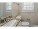 Bathroom features granite countertop, sink, and toilet at 2182 Loring Ct, Decatur, GA 30032