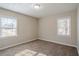 Bright bedroom with neutral walls and carpet at 2182 Loring Ct, Decatur, GA 30032