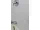 Clean shower with white tile and chrome fixtures at 2182 Loring Ct, Decatur, GA 30032
