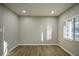 Spacious dining area with hardwood floors and large windows at 93 Sterling Ridge Dr, Jonesboro, GA 30238
