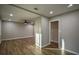 Open living area with hardwood floors and ceiling fan at 93 Sterling Ridge Dr, Jonesboro, GA 30238