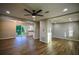 Open concept living space with hardwood floors and kitchen views at 93 Sterling Ridge Dr, Jonesboro, GA 30238