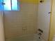 Clean bathroom with tiled walls and bathtub at 3181 Abbeywood Dr, Decatur, GA 30034