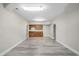 Finished basement with vinyl flooring and wet bar at 3356 Renfro St, Marietta, GA 30066