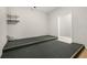 Finished basement room with carpet and shelving at 3356 Renfro St, Marietta, GA 30066