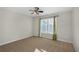 Charming bedroom with ceiling fan, window, and neutral wall colors at 3356 Renfro St, Marietta, GA 30066