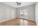 Bright bedroom with hardwood floors and a ceiling fan at 3356 Renfro St, Marietta, GA 30066