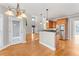 Spacious kitchen with island, stainless steel appliances, and hardwood floors at 3356 Renfro St, Marietta, GA 30066