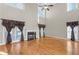Large living room with hardwood floors, fireplace, and high ceilings at 3356 Renfro St, Marietta, GA 30066