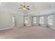 Spacious main bedroom with carpeting, high ceilings, and abundant natural light at 3356 Renfro St, Marietta, GA 30066