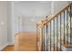 Elegant staircase with wood railing and detailed banister at 3356 Renfro St, Marietta, GA 30066