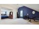 Multi-functional bedroom with a desk and home gym area at 4450 Millenium View Ct, Snellville, GA 30039