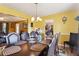 Formal dining room with a large table and leather chairs at 4450 Millenium View Ct, Snellville, GA 30039