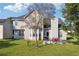 Two story home with large backyard and patio at 4450 Millenium View Ct, Snellville, GA 30039