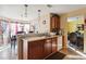 Kitchen with an island, wood cabinets and a breakfast nook at 4450 Millenium View Ct, Snellville, GA 30039