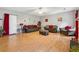 Spacious living room with ample seating, hardwood floors, and neutral wall colors at 4450 Millenium View Ct, Snellville, GA 30039