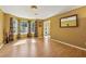 Bright living room with hardwood floors, a bay window, and neutral wall color at 4450 Millenium View Ct, Snellville, GA 30039