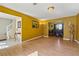 Spacious living room features hardwood floors and leads to the dining room and staircase at 4450 Millenium View Ct, Snellville, GA 30039