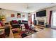 Living room features hardwood floors, fireplace, and large TV at 4450 Millenium View Ct, Snellville, GA 30039
