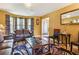 Bright living room with leather furniture and a large window at 4450 Millenium View Ct, Snellville, GA 30039