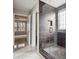 Modern bathroom with a large glass shower and stylish tile at 5480 Sable Bay Pt, Atlanta, GA 30349
