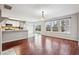 Bright dining area with hardwood floors and view to backyard at 5480 Sable Bay Pt, Atlanta, GA 30349