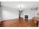 Dining room with hardwood floors and a fireplace at 5480 Sable Bay Pt, Atlanta, GA 30349