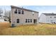 Two-story house with backyard and sliding glass doors at 5480 Sable Bay Pt, Atlanta, GA 30349