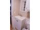 Small bathroom with white vanity, single sink, and decorative mirror at 1400 New Hope Church Rd, Loganville, GA 30052