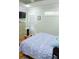 Main bedroom featuring a queen bed, hardwood floors, and private door access at 1400 New Hope Church Rd, Loganville, GA 30052