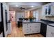 Eat-in kitchen with island and plenty of cabinet storage at 1400 New Hope Church Rd, Loganville, GA 30052