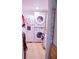 Convenient laundry room with washer, dryer, and extra storage at 1400 New Hope Church Rd, Loganville, GA 30052