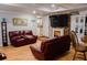 Spacious living room with fireplace and built-in shelving at 1400 New Hope Church Rd, Loganville, GA 30052