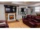 Living room featuring a brick fireplace and comfortable seating at 1400 New Hope Church Rd, Loganville, GA 30052
