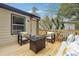 Deck with seating area and fire pit table, adjacent to house at 2082 Perkerson Sw Rd, Atlanta, GA 30310