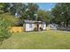 Newly renovated home with fenced yard and spacious lawn at 2082 Perkerson Sw Rd, Atlanta, GA 30310