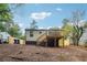 Back of house with new deck and landscaping at 2082 Perkerson Sw Rd, Atlanta, GA 30310