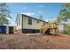 Back of house with new deck and landscaping at 2082 Perkerson Sw Rd, Atlanta, GA 30310