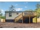 Back of house with new deck and landscaping at 2082 Perkerson Sw Rd, Atlanta, GA 30310