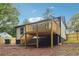 Back of house with new deck and landscaping at 2082 Perkerson Sw Rd, Atlanta, GA 30310